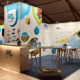 Stand RSE Transversale. Conception de stand sur mesure pour salon et foire expo Occitanie France et europe. Tissus tendus et impressions grands formats